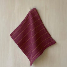 Load image into Gallery viewer, Pink fabric with gold stripes on a beige background