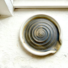 Load image into Gallery viewer, Bronze coloured spoon rest on window ledge