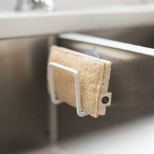 Load image into Gallery viewer, Beige towel hanging on a white towel rack above a sink