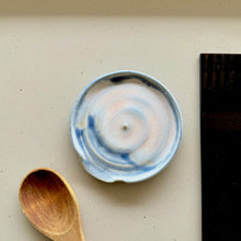 Load image into Gallery viewer, Small ceramic dish with blue spiral pattern next to a wooden spoon on a light surface.