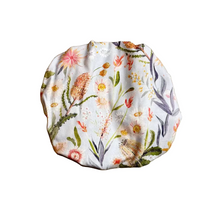 Load image into Gallery viewer, Floral-patterned fabric circle on a beige background
