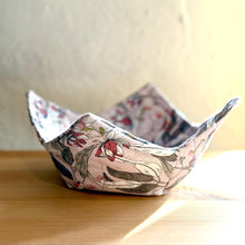 Load image into Gallery viewer, Floral-patterned fabric bowl on a wooden surface with a neutral background