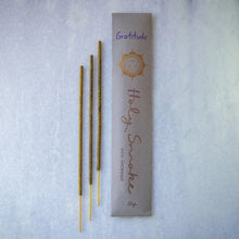 Load image into Gallery viewer, Incense sticks with packaging labeled 'Gratitude' on a light gray background
