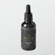 Load image into Gallery viewer, Black bottle of milie Organics Hemp Balancing Facial Oil on a light gray background
