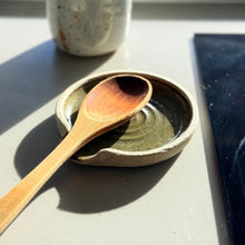 Load image into Gallery viewer, Ceramic dish with wooden spoon on a light surface, with a blurred background
