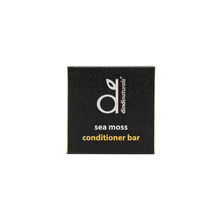 Load image into Gallery viewer, Black packaging of a sea moss conditioner bar with a brand logo on a white background

