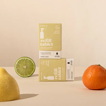 Load image into Gallery viewer, Refill tablet packaging with a lemon, lime, and orange on a beige background
