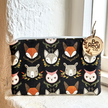 Load image into Gallery viewer, Pouch with animal pattern and 'Be Real Co.' tag on a white surface
