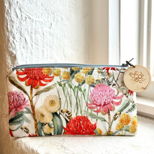 Load image into Gallery viewer, Floral-patterned pouch with a wooden tag on a white surface
