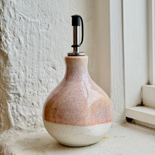Load image into Gallery viewer, Decorative ceramic bottle with a textured finish on a light surface.
