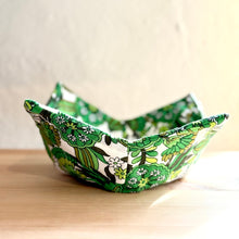 Load image into Gallery viewer, Green patterned paper bowl on a wooden surface with a plain background
