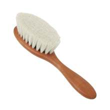 Load image into Gallery viewer, Wooden brush with bristles on a white background
