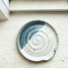 Load image into Gallery viewer, Ceramic dish with blue and white design on a textured white surface
