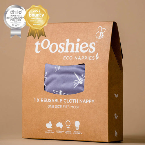 tooshies eco nappies packaging with awards on a brown background