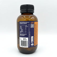 Load image into Gallery viewer, An amber glass supplement bottle with a black ribbed cap, showing the back label with nutritional information, a barcode, and an orange side panel, photographed on a light gray background.
